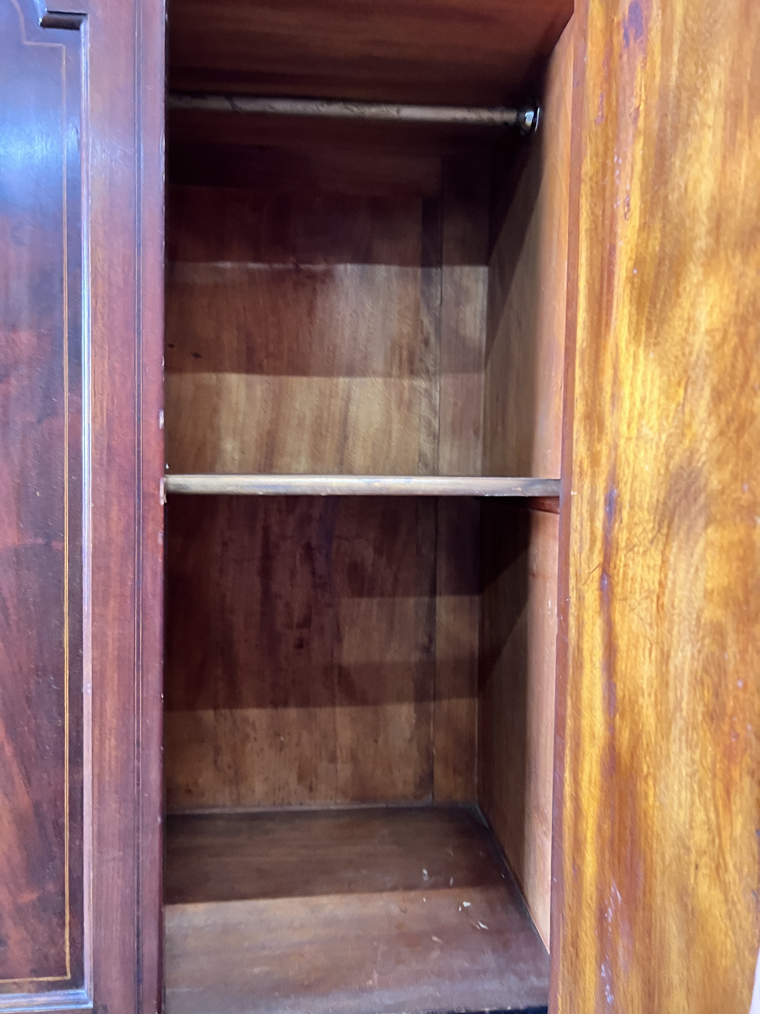 An Edwardian satinwood banded mahogany mirrored wardrobe, width 190cm, depth 56cm, height 212cm